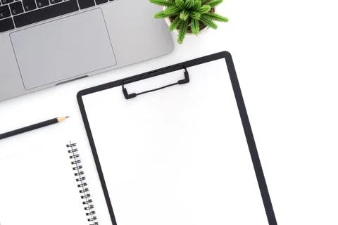 Creative flat lay photo of workspace desk. Top view office desk with laptop.. Stock Photos