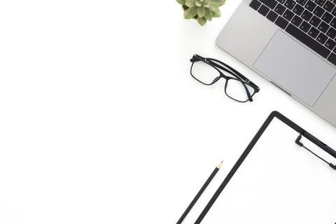 Creative flat lay photo of workspace desk. Top view office desk with laptop.. Stock Photos