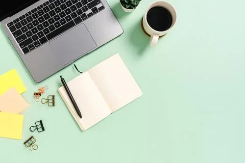 Creative flat lay photo of workspace desk. Top view office desk with laptop.. Stock Photos