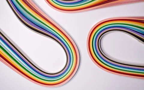 A creative flat lay showcasing a collection of colorful paper quilling strips Stock Photos