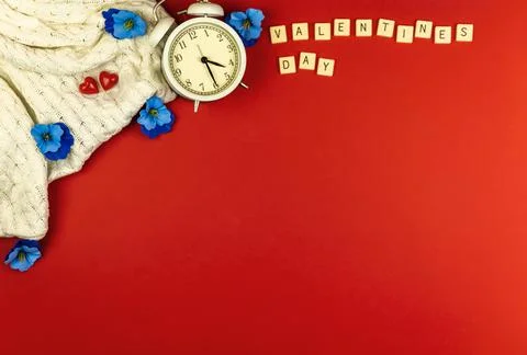 Creative flat lay Valentine's day background on red, copy space, letters and  Stock Photos