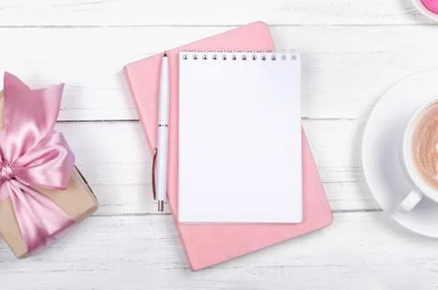 Creative flat lay of workspace desk, notepad and lifestyle objects on wooden  Stock Photos