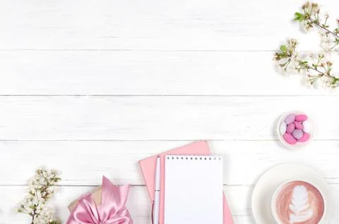 Creative flat lay of workspace desk, notepad and lifestyle objects on wooden  Stock Photos