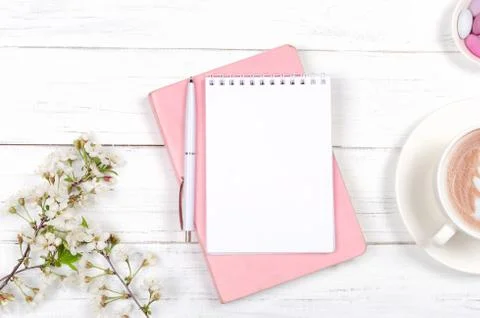 Creative flat lay of workspace desk, notepad and lifestyle objects on wooden  Stock Photos