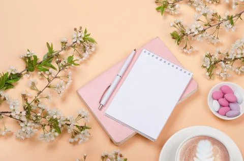 Creative flat lay of workspace desk, notepad and lifestyle objects on yellow  Stock Photos
