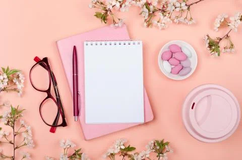 Creative flat lay of workspace desk, notepad and lifestyle objects on yellow  Stock Photos
