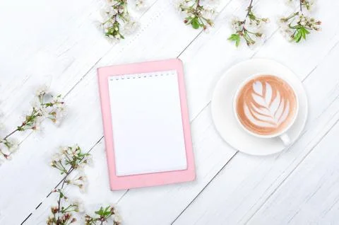 Creative flat lay of workspace desk, notepad and lifestyle objects on wooden Stock Photos