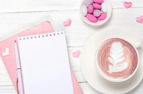 Creative flat lay of workspace desk, notepad and lifestyle objects on wooden Stock Photos