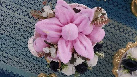 Creative Flower Arrangement Using Towels decorations Stock Photos