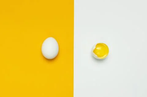 Creative food minimalistic background, Easter. White chicken egg Stock Photos