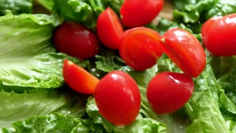 Creative Food Presentation: Cherry Tomatoes Shaped as Bunnies on Lettuce Stock Footage 309547208