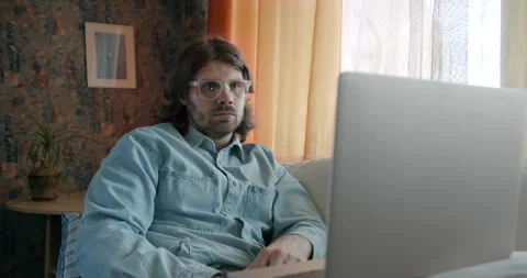 Creative freelancer man working at home with laptop using Artificial intelligenc Stock Footage 245810453