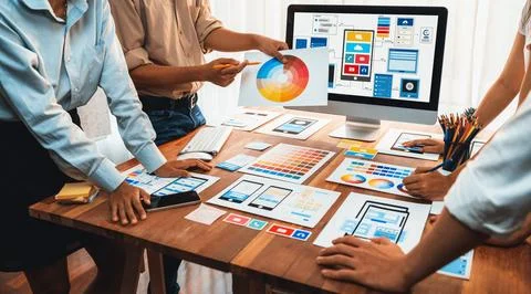 Creative front-end developer brainstorming UI design. Scrutinize Stock Photos