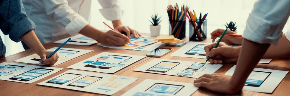 Creative front-end developer brainstorming UI design. Scrutinize Stock Photos