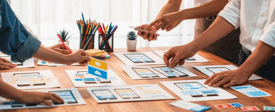 Creative front-end developer brainstorming UI design. Scrutinize Stock Photos