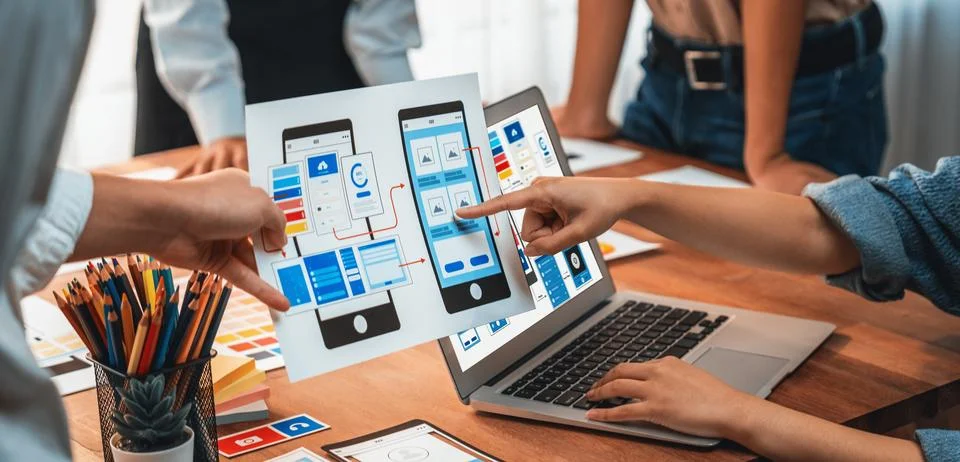 Creative front-end developer brainstorming UI design. Scrutinize Stock Photos