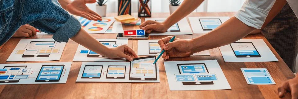 Creative front-end developer brainstorming UI design. Scrutinize Stock Photos
