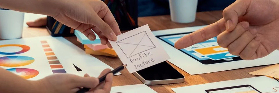 Creative front-end developer brainstorming UI design. Scrutinize Stock Photos