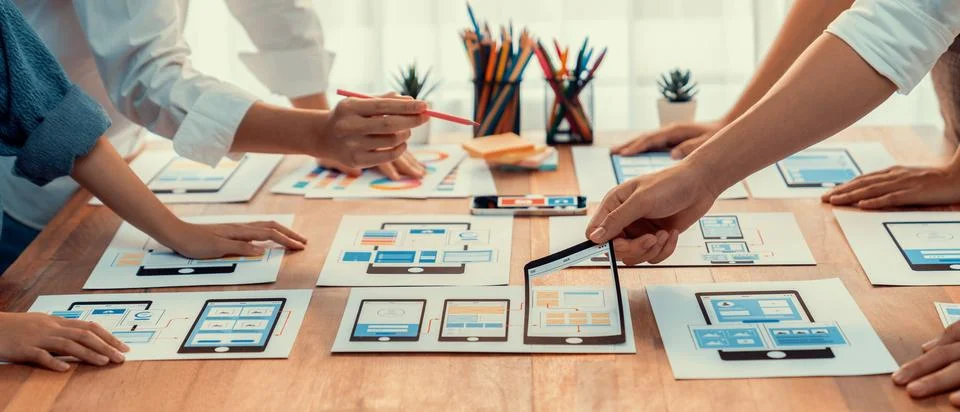 Creative front-end developer brainstorming UI design. Scrutinize Stock Photos