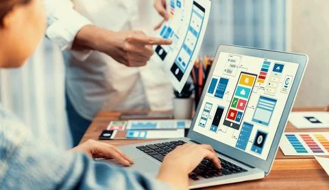 Creative front-end developer brainstorming UI design. Scrutinize Stock Photos