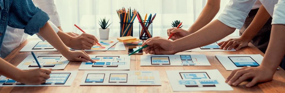 Creative front-end developer brainstorming UI design. Scrutinize Stock Photos