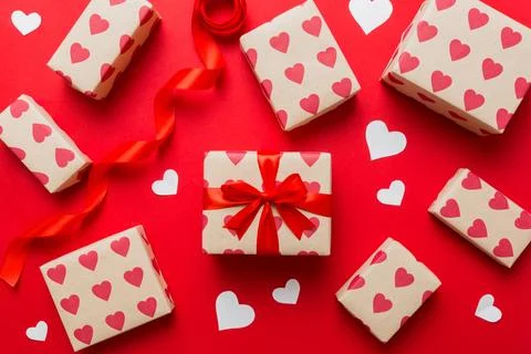 Creative gift box with decorations for the holiday, top view. Birthday and .. Stock Photos