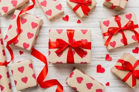 Creative gift box with decorations for the holiday, top view. Birthday and .. Stock Photos