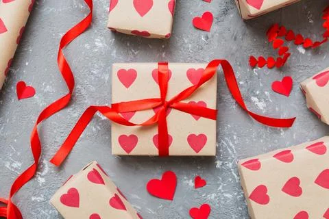 Creative gift box with decorations for the holiday, top view. Birthday and .. Stock Photos