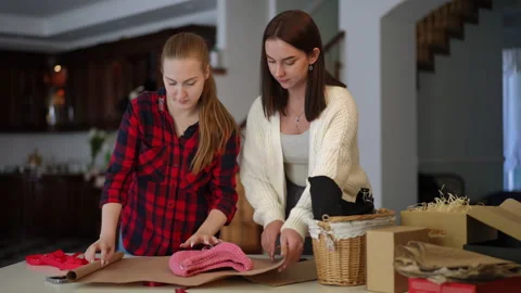 Creative Gift Wrapping with Friends for a Memorable Experience Together Stock Footage 302194140