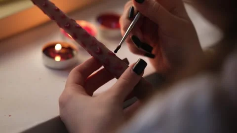 Creative Girl Decorating Handmade Candle Using Melted Wax And Paintbrush Stock Footage 339024122