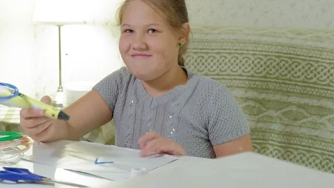 Creative girl using 3d pen printing 3D shape. Stock Footage 93542121