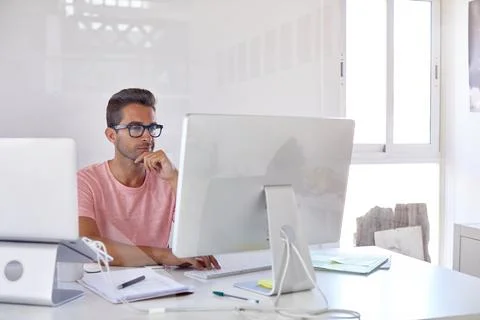 Creative, glasses and man with computer in business, research and graphic d.. Stock Photos