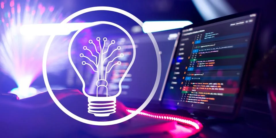Creative glowing light bulb with computer program code on the screen. Techn.. Stock Photos