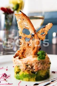 Creative gourmet food arranged on the restaurant plate Stock Photos