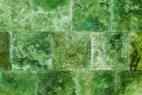 Creative green background wall of marble tiles Stock Photos