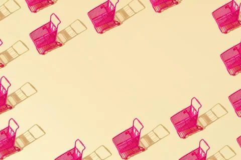 Creative grocery basket cart pattern flat lay on yellow background copy space 스톡 사진