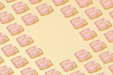 Creative grocery basket cart pattern flat lay on yellow background copy space Foto stock