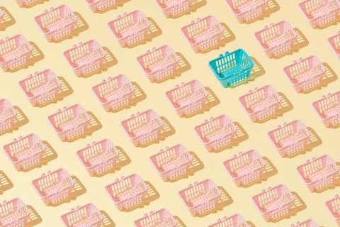 Creative grocery basket cart pattern flat lay on yellow background minimalism Stock Photos