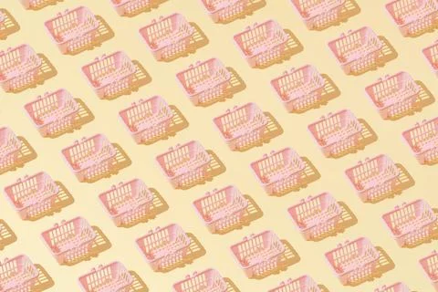 Creative grocery basket cart pattern flat lay on yellow background minimalism Stock Photos