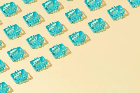 Creative grocery basket cart pattern flat lay on yellow background copy space Stock Photos