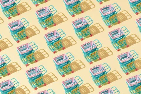 Creative grocery basket cart pattern flat lay on yellow background minimalism Foto stock