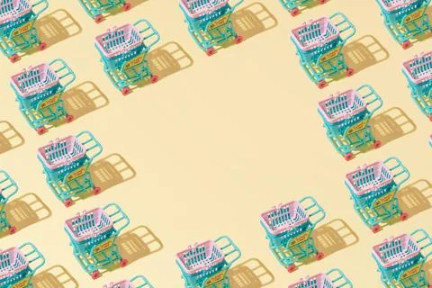 Creative grocery basket cart pattern flat lay on yellow background copy space Stock Photos