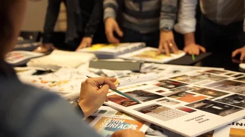 Creative group of designers in a meeting. Stock Footage 72564416