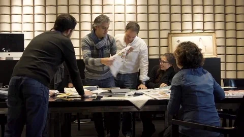 Creative group of designers in a meeting. Video stock 72564503