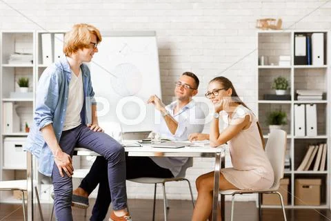 Creative group discussing new working ideas Stock Photos