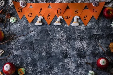 Creative Halloween background with themed marshmallows and apples. Place for  Stock Photos