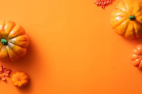 Creative Halloween design concept background with pumpkin, autumn leaves and  Stock Photos