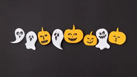 Creative handmade application with pattern of terrible spirits smiling and Fotos de archivo
