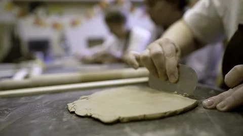 Creative Hands Engaged in Artistic Work The Art of Clay Shaping in Art Class 스톡 사진