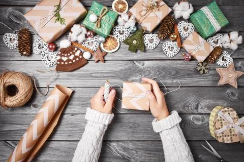Creative hobby. Christmas presents with tools and decorations. Packing presents Stock Photos
